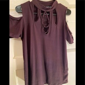 Short sleeve with open neck detail and open shoulder
